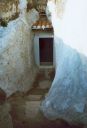 Sant'Antioco, Villaggio Ipogeo: accesso ad una tomba ipogea punica utilizzata come abitazione di fortuna fino agli anni '70 del secolo scorso.